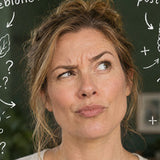 A woman frowning in thought, with hand-drawn question marks around her
