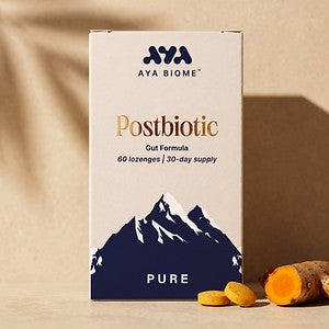AYA BIOME™ PURE box with two chewable tablets and fresh turmeric root